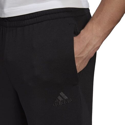adidas Men's Essentials French Terry Tapered Cuff Logo Pants in Saudi Arabia