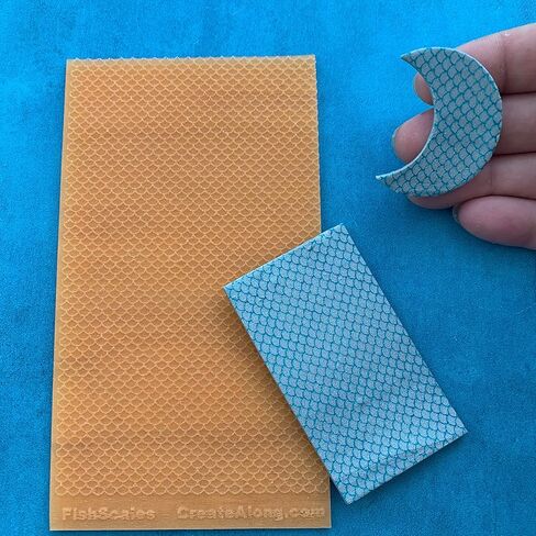 موازين ورقية من نسيج حوريات البحر على شكل سمكة التنين والمزيد من طين البوليمر وختم الوسائط المختلطة in Kuwait