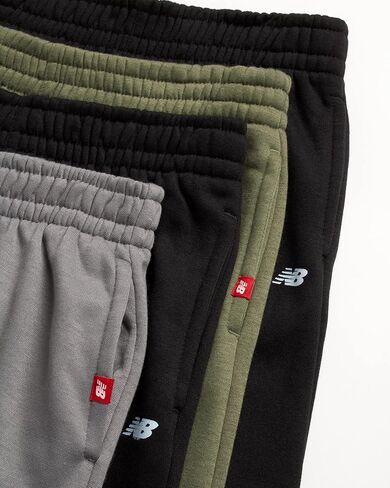 New Balance Boys’ Active Sweatpants – 4 Pack Performance Fleece Jogger Sweatpants for Boys – Jogger Pants with Pockets (8-20) in Saudi Arabia