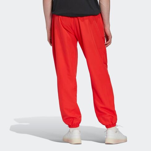 بنطال منسوج Aeroready من adidas Sportswear للرجال in Saudi Arabia