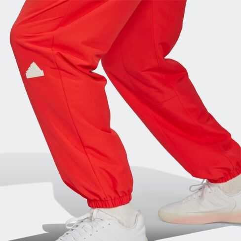 بنطال منسوج Aeroready من adidas Sportswear للرجال in Saudi Arabia