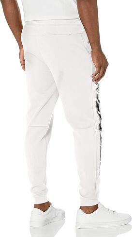 بنطال الركض ذو الوجهين النحيف للرجال من لاكوست مع خصر قابل للتعديل in Kuwait