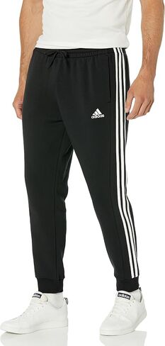 adidas Men's Essentials Fleece Tapered Cuffed 3-Stripes Pants, Black/White, Small in Saudi Arabia