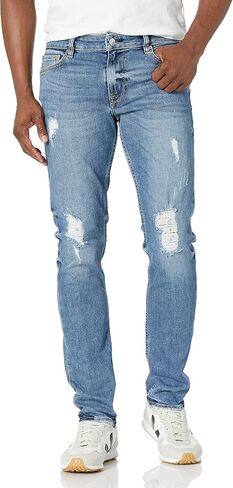 GUESS Men's Distressed Slim Fit Tapered Leg Jeans in Saudi Arabia