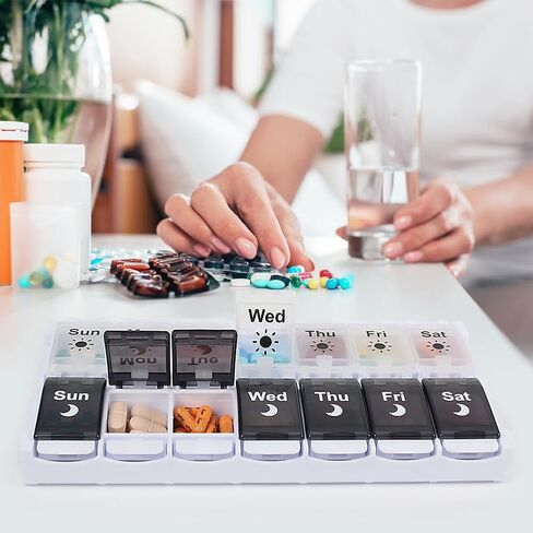 HRX Package Large Pill Organizer 2 Times a Day, Push Button Weekly Medicine Box Vitamin Cases for 7 Day AM PM in Saudi Arabia