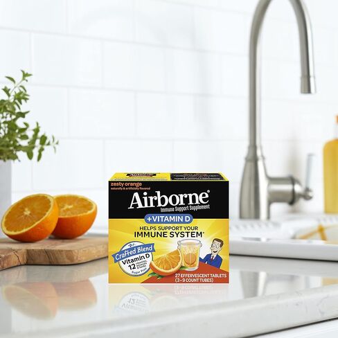 Airborne 750mg Vitamin C with Zinc Effervescent Tablets, Immune Support Supplement with Powerful Antioxidants Vitamins A C D3 & E - 27 Fizzy Drink Tablets, Zesty Orange Flavor in Kuwait