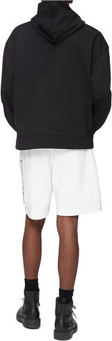 Calvin Klein Men's Relaxed Fit Logo French Terry Hoodie in Saudi Arabia