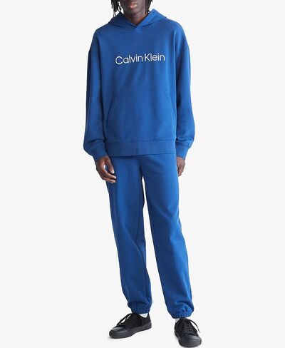 Calvin Klein Men's Relaxed Fit Logo French Terry Hoodie in Saudi Arabia