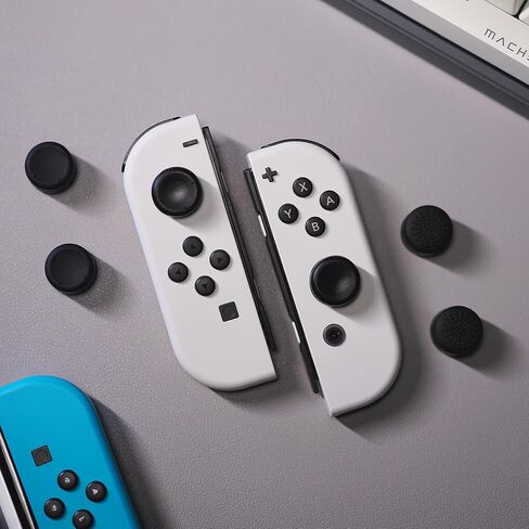 eXtremeRate 4 Pairs Black Anti-Slip Silicone Extended Length Thumb Grips Thumbstick Caps Case Cover for Nintendo Switch and Switch OLED Joy-con Controller, Joystick Cover Caps for Nintendo Switch Lite in Saudi Arabia