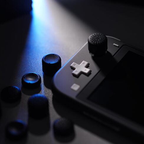 eXtremeRate 4 Pairs Black Anti-Slip Silicone Extended Length Thumb Grips Thumbstick Caps Case Cover for Nintendo Switch and Switch OLED Joy-con Controller, Joystick Cover Caps for Nintendo Switch Lite in Saudi Arabia