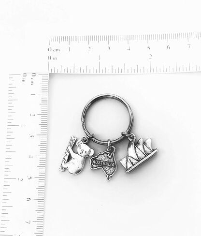Australia theme keychain. Includes Australia Continent, Sydney Opera House, and a Koala. in Saudi Arabia