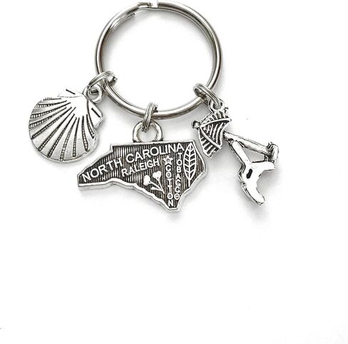 North Carolina beach theme keychain. Includes State of North Carolina, Beach Chair with Umbrella, and Seashell in Saudi Arabia