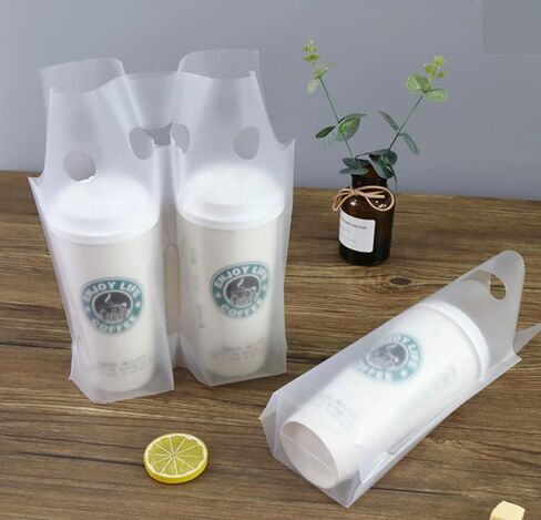 100 قطعة من أكياس بولي الشرب بمقبض، أكياس تغليف بلاستيكية شفافة لتوصيل الطعام، 6.3 بوصة × 11 بوصة تحمل ما يصل إلى 32 أونصة من الأكواب، حامل أكواب بفتحة معلقة مع مقبض للإخراج والمشروبات in Kuwait