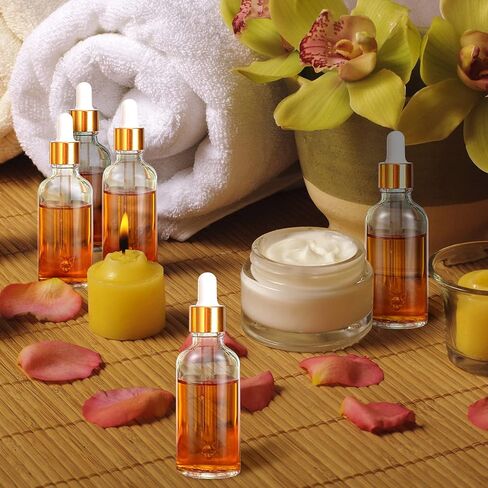 عبوة من 50 زجاجة قطارة للعين مع أغطية من Nuogo، زجاجات قطارة زجاجية سعة 2 أونصة مع 5 قطارات للزيوت العطرية، 3 أقماع بلاستيكية، 30 ملصقًا للعطور وزيت الجسم السائل وزيت التجميل (شفاف) in Kuwait