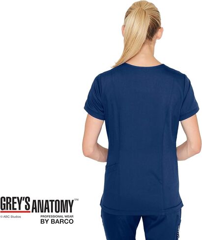 BARCO Grey's Anatomy Scrubs - Kira Scrub Top للنساء، رقبة على شكل حرف V، جيب بسحاب مطبوع عليه Love، قميص فرك نسائي فائق النعومة in Kuwait