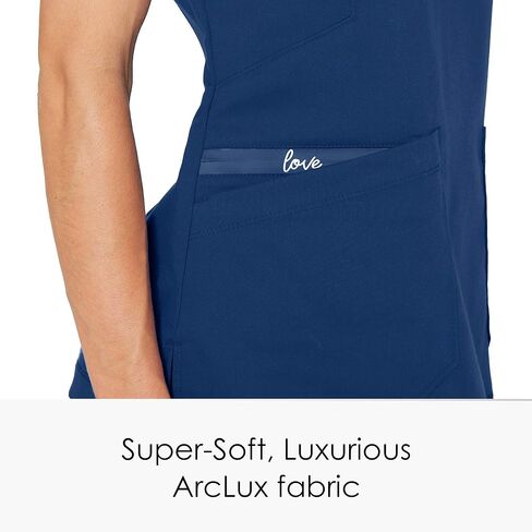 BARCO Grey's Anatomy Scrubs - Kira Scrub Top للنساء، رقبة على شكل حرف V، جيب بسحاب مطبوع عليه Love، قميص فرك نسائي فائق النعومة in Kuwait