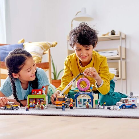 LEGO City Donut Shop Opening 60233 Store Opening Build and Play with Toy Taxi, Van and Truck with Crane, Easy Build with Minifigures for Boys and Girls (790 Pieces) in Saudi Arabia