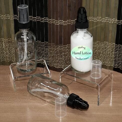 GBO GLASSBOTTLEOUTLET.COM (Pack of 24) 2 oz. Clear Boston Round with Black Treatment Pump in Kuwait