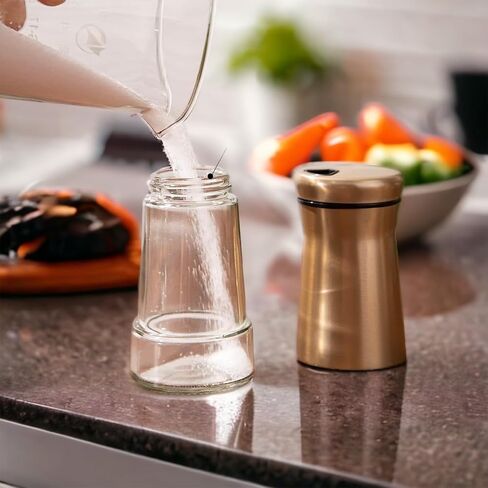 Elegant Silver Salt and Pepper Shaker Set Adjustable Stainless Steel and Glass Modern Design Adjustable Top Makes it the ideal Spice and Seasoning Dispenser Kitchen Sugar and Cinnamon Shakers in Saudi Arabia