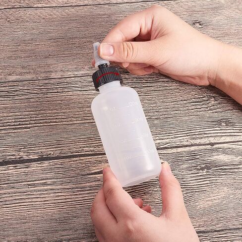 12 عبوة من زجاجات توزيع الضغط البلاستيكية بسعة 118 مل مع غطاء ملتوي أسود وقياس، فوهة مفتوحة/مغلقة - جيدة للحرف اليدوية والفنون والغراء ومتعددة الأغراض in Kuwait