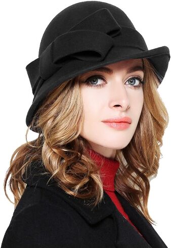 قبعة شتوية نسائية من Bellady بلون سادة 100% من الصوف مع لمسة فيونكة in Kuwait