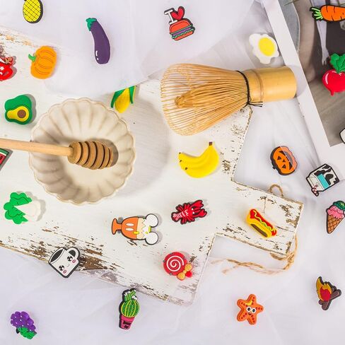 Lenreta Lot of 30,50,69,100 PCS Different Shaped PVC Shoe Charms for Shoe Decoration + Shoelace Adapters,Charms for Halloween, Easter, Christmas, Birthday,Party Gifts... in Saudi Arabia