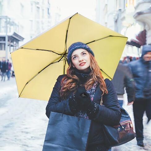 LEAGERA Mini Umbrella For Purse - UPF 50+ UV Blocker Sun Protection Umbrella, Small Micro Travel Parasol Design for Women, Yellow in Kuwait