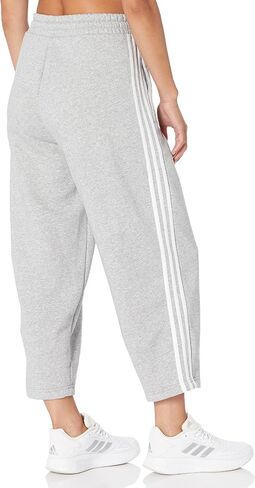 adidas Women's Essentials 3-Stripes Open Hem Fleece Pants in Kuwait