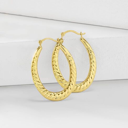 Ross-Simons 14kt Yellow Gold Twisted Oval Hoop Earrings in Saudi Arabia