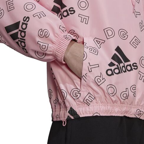 سترة واقية فضفاضة بطباعة شعار أساسي للنساء من adidas in Saudi Arabia