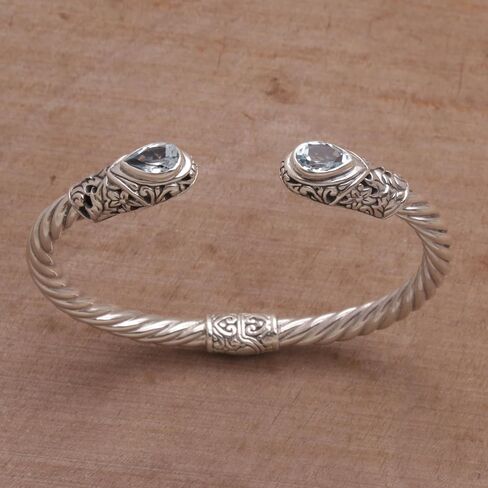 NOVICA Artisan Handmade Blue Topaz Cuff Bracelet Silver Floral from Bali Sterling Indonesia Birthstone 'Floral Iridescence' in Saudi Arabia