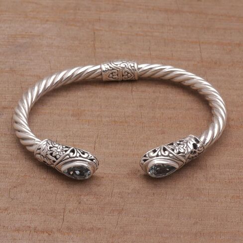 NOVICA Artisan Handmade Blue Topaz Cuff Bracelet Silver Floral from Bali Sterling Indonesia Birthstone 'Floral Iridescence' in Saudi Arabia