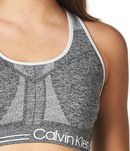 Calvin Klein Women's Performance Moisture Wicking Medium Impact Reversible Seamless Sports Bra in Saudi Arabia