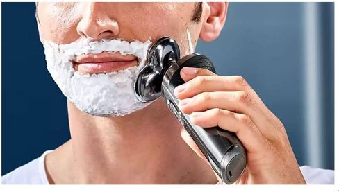 ماكينة الحلاقة الكهربائية Philips Norelco SP9860/86 Series 9000 مع أداة التشذيب الدقيقة SmartClick | الحقيبة المميزة | شاحن تشي in Kuwait