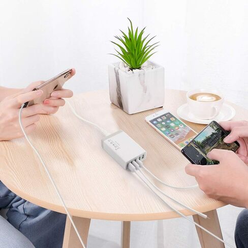 قاعدة شحن من الخيزران لأجهزة متعددة مع شاحن USB بخمسة منافذ و5 كابلات شحن وحامل للساعة. منظم محطات إرساء سطح المكتب الخشبي للهاتف الخلوي، والكمبيوتر اللوحي، والساعة، وإكسسوارات المكتب in Kuwait