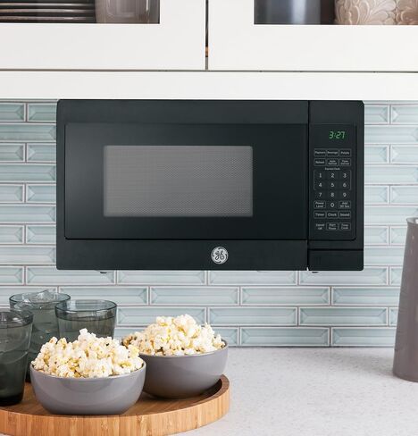GE JEM3072DHBB Microwave Oven Includes Optional Hanging Kit, Kitchen Essentials for The Countertop, 0.7 Cubic Feet Capacity, Black in Saudi Arabia