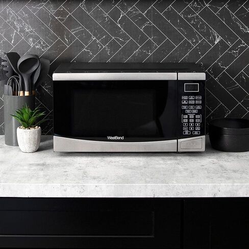 West Bend Microwave Oven, 900W, 0.9 cu. ft., in Stainless Steel | West Bend Microwave Oven, 900W, 10 Power Levels, One-Touch Cooking, Glass Turntable, 0.9 cu. ft., in Stainless Steel in Kuwait