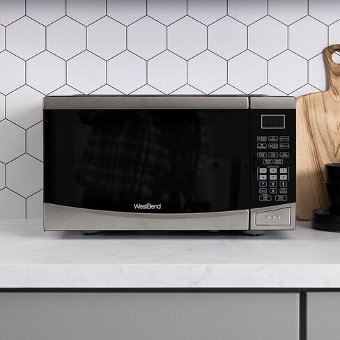 West Bend Microwave Oven, 900W, 0.9 cu. ft., in Stainless Steel | West Bend Microwave Oven, 900W, 10 Power Levels, One-Touch Cooking, Glass Turntable, 0.9 cu. ft., in Stainless Steel in Kuwait