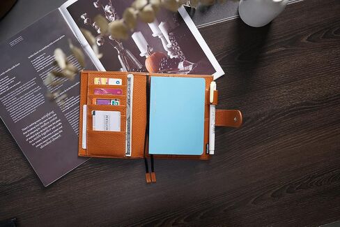 غطاء جلدي من Moterm لأجهزة الكمبيوتر المحمولة مقاس A6 - يناسب مخططات Hobonichi وStalology وMidori MD، مع حلقة قلم وفتحات للبطاقات وجيب خلفي (برتقالي محروق بالحصى، A6+) in Kuwait