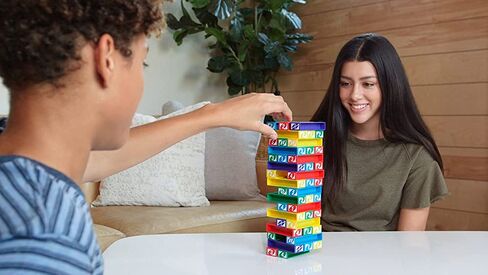 Mattel Games UNO StackoGame for Kids and Family with 45 Colored Stacking Blocks, Loading Tray and Instructions, Makes a Great Gift for 7 Year Olds and Up (43535) in Kuwait