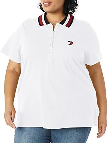 قميص بولو كلاسيكي بأكمام قصيرة للسيدات من Tommy Hilfiger (مقاس قياسي وحجم كبير) in Kuwait