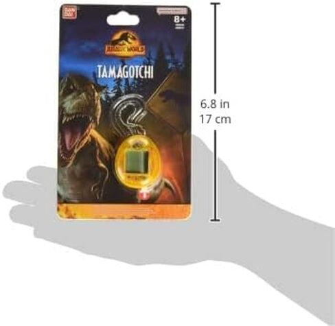 الذكرى السنوية الثلاثين لـ Tamagotchi Nano x Jurassic Park - إصدار Dinosaur Amber. in Kuwait