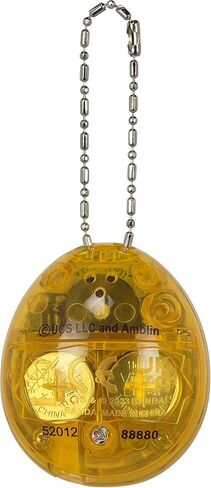 الذكرى السنوية الثلاثين لـ Tamagotchi Nano x Jurassic Park - إصدار Dinosaur Amber. in Kuwait