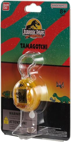الذكرى السنوية الثلاثين لـ Tamagotchi Nano x Jurassic Park - إصدار Dinosaur Amber. in Kuwait