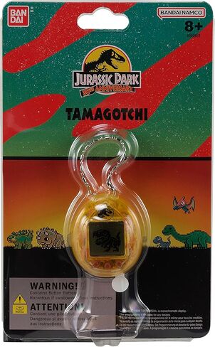 الذكرى السنوية الثلاثين لـ Tamagotchi Nano x Jurassic Park - إصدار Dinosaur Amber. in Kuwait