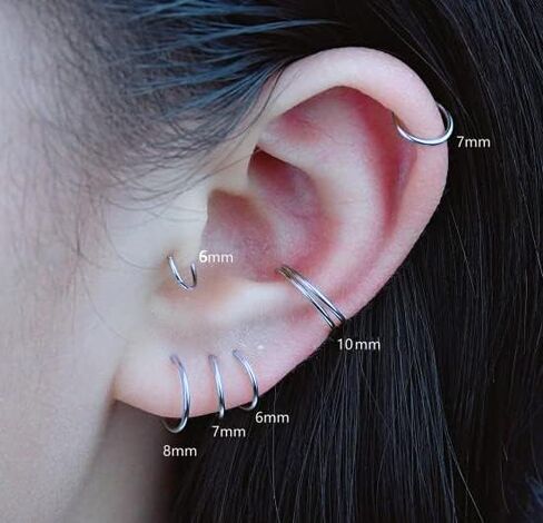MOTBEGIT Small Gold Hoop Earrings: 14K Gold Plated Huggie Hoop Earrings for Cartilage Helix Tragus 18g Tiny Thin Hoop Earrings for Women Men Girls in Saudi Arabia