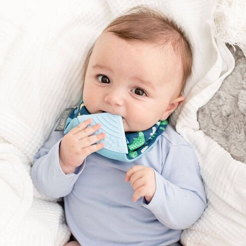 مريلة التسنين Cheeky Chompers Neckerchew (Baby Dino)، مريلة 2 في 1 على شكل باندانا مع عضاضة من السيليكون الآمن غذائيًا، للأطفال والرضع، تصميم مبتكر على شكل غمازات يهدئ اللثة، مريلة ماصة مكونة من 3 طبقات in Kuwait