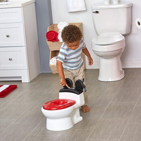 The First Years Training Wheels Racer Potty Training Toilet - Race Car Training Potty - Includes Detachable Toddler Toilet Seat and Kids Potty - Ages 18 Months and Up in Saudi Arabia
