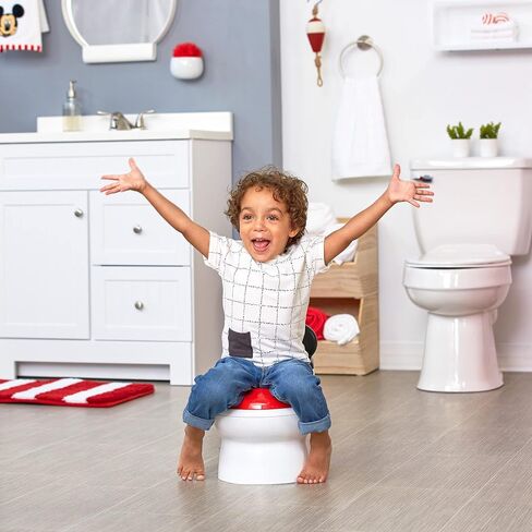 The First Years Training Wheels Racer Potty Training Toilet - Race Car Training Potty - Includes Detachable Toddler Toilet Seat and Kids Potty - Ages 18 Months and Up in Saudi Arabia