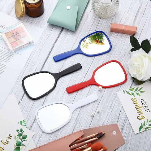 مرآة يد صغيرة محمولة باليد، مرآة مكياج للسفر، مرآة مستحضرات تجميل محمولة مع مقبض، مرآة شخصية، مرآة فانيتي محمولة بعرض 3.15 بوصة وطول 7.09 بوصة (أزرق، أسود، أحمر، أبيض، 8 قطع) in Kuwait